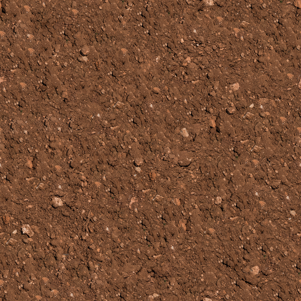 Brown Plowed Soil. Seamless Tileable Texture. .